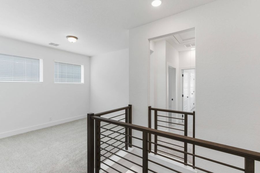 Spacious, unfurnished interior of a new home in Centero at Stone Oak, San Antonio (Image 26).