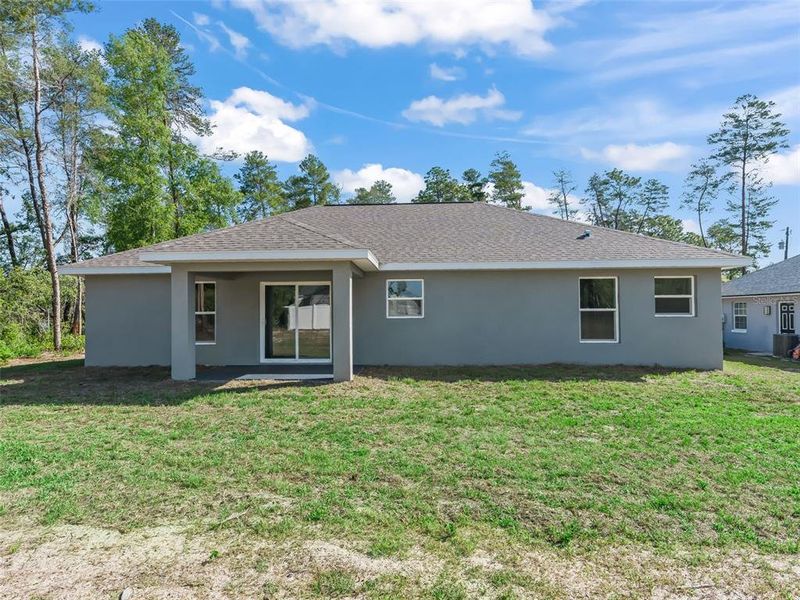 Exterior details and patio area of a home in , Ocala (Image 25).