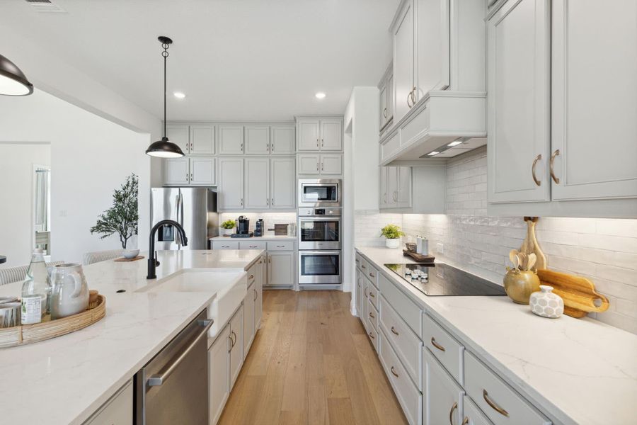 Kitchen | Concept 3441 at Hidden Creek Estates in Van Alstyne, TX by Landsea Homes