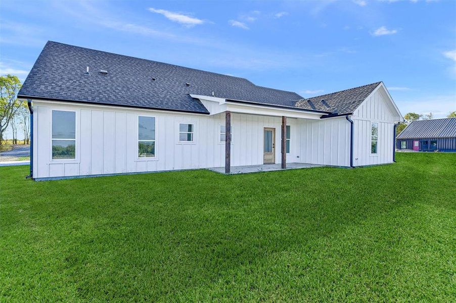 Exterior details and patio area of a home in , Savoy (Image 27). Exterior details and patio area of a home in , Savoy (Image 27).