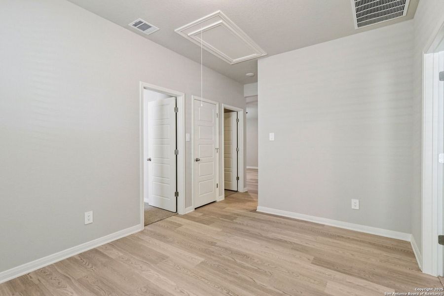Spacious, unfurnished interior of a new home in Estancia Ranch - Premier Series, San Antonio (Image 19).