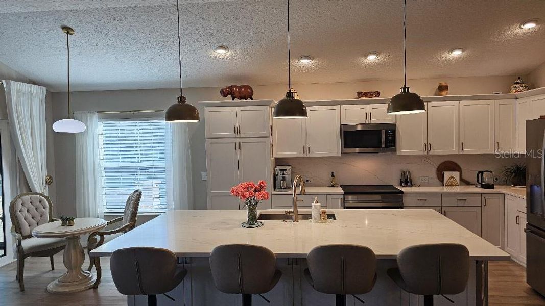 Furnished interior view inside a new home in , The Villages (Image 12).