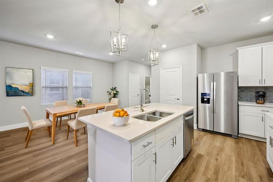 Furnished interior view inside a new home in Parks at Foster Crossing - Spring Series, Anna (Image 9).