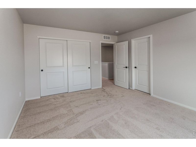 Spacious, unfurnished interior of a new home in Prairie Song Story Collection - Single Family Homes, Windsor (Image 33).