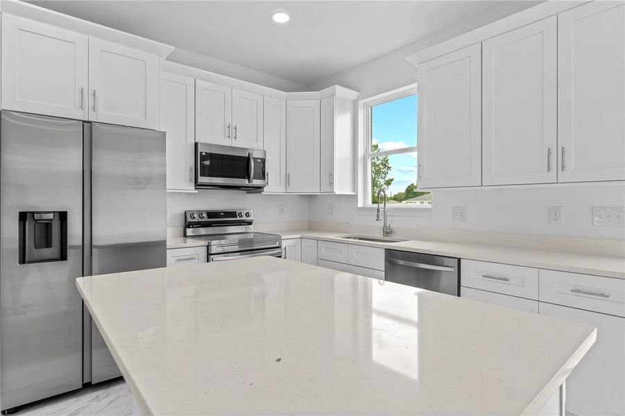 Furnished interior view inside a new home in , Dunnellon (Image 9).