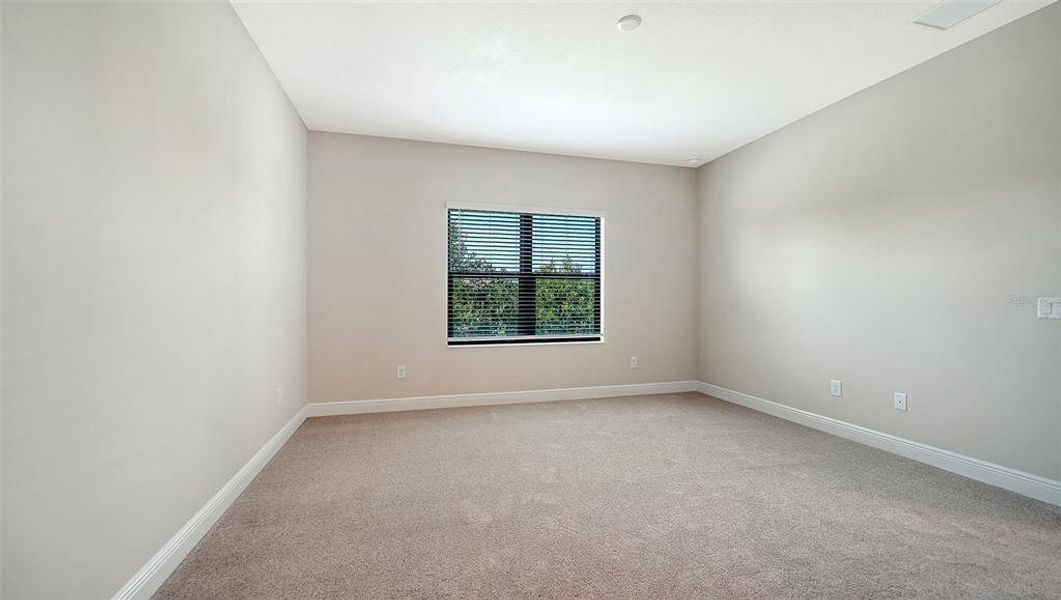 Spacious, unfurnished interior of a new home in Vicenza Real Estate and Homes for Sale in North Venice, FL - Neal Communities, Nokomis (Image 15).