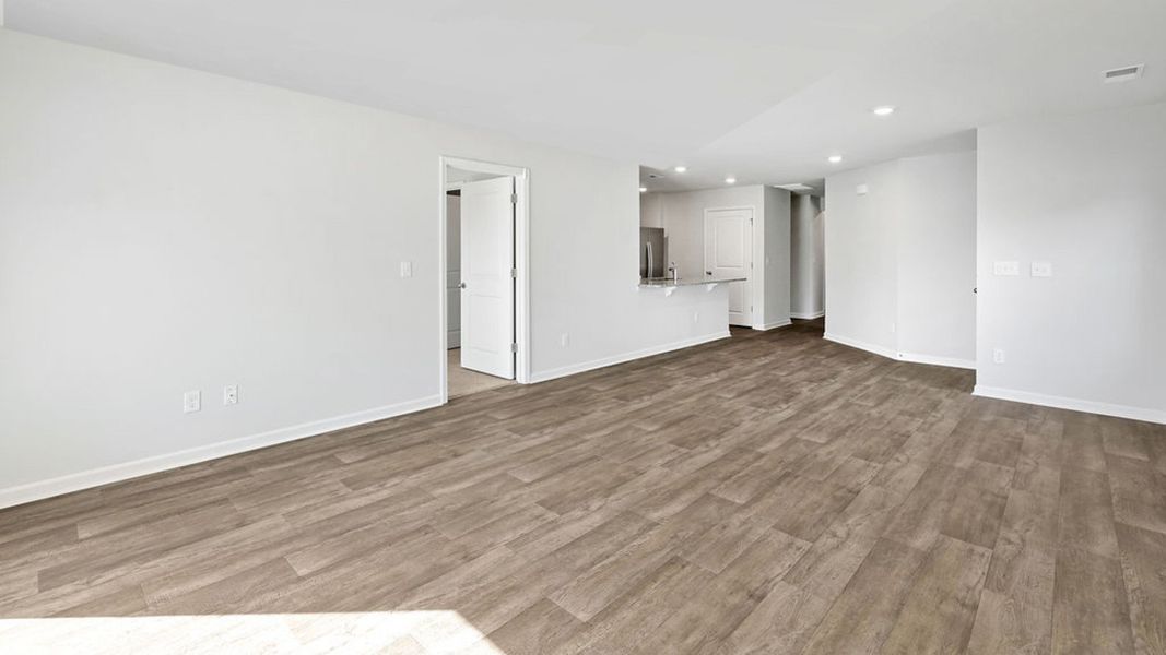 Representative unfurnished interior of a home built from the BAYSHORE by D.R. Horton in Indigo Preserve Townhomes, Leland (Image 19).