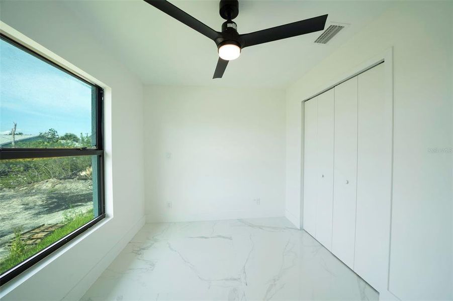 Spacious, unfurnished interior of a new home in , Punta Gorda (Image 40).