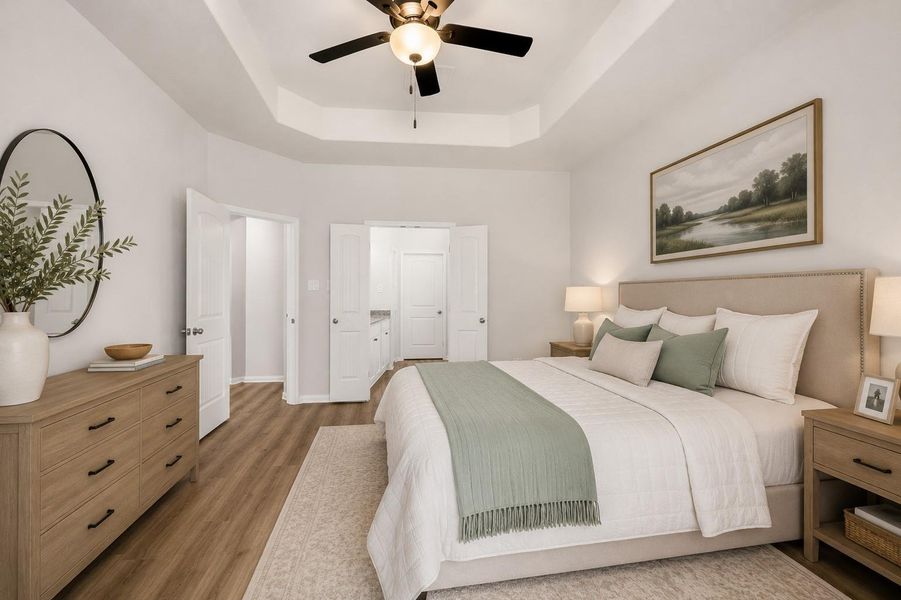 Appreciate the tray ceiling and LVP flooring in your primary