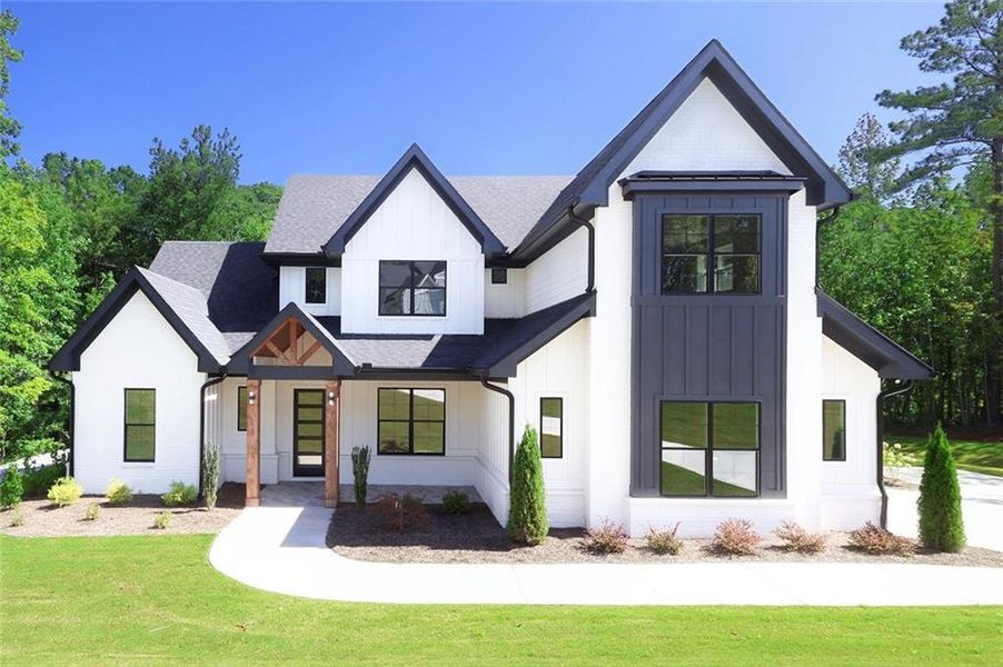 Front exterior of a new home in , Newnan, GA, highlighting curb appeal (Image 2).