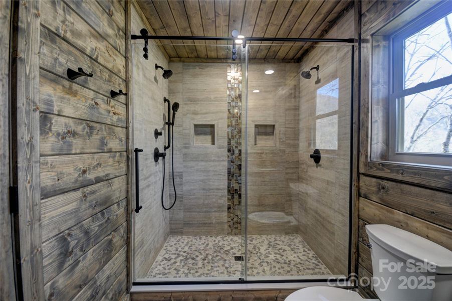 Primary bath with a large, tiled shower for two