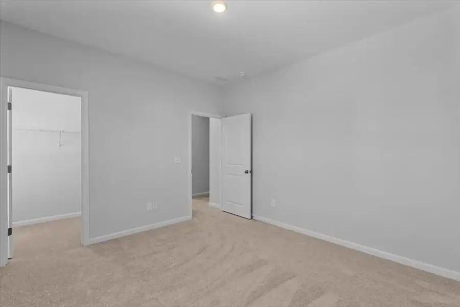 Spacious, unfurnished interior of a new home in Lilah Grove, Summerfield (Image 48).