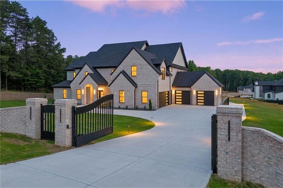 Front exterior of a new home in , Buford, GA, highlighting curb appeal (Image 1). Front exterior of a new home in , Buford, GA, highlighting curb appeal (Image 1).
