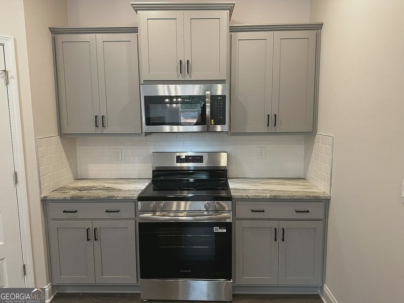 Furnished interior view inside a new home in Canterbury Villas, Carrollton (Image 6).