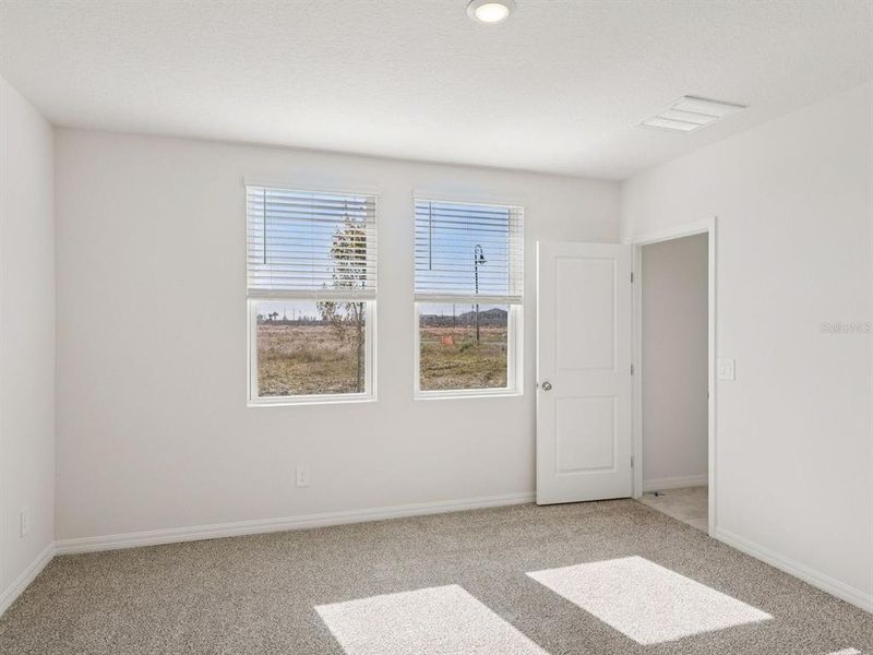 Spacious, unfurnished interior of a new home in Springs at Lake Alfred - Classic Series, Lake Alfred (Image 6). Spacious, unfurnished interior of a new home in Springs at Lake Alfred - Classic Series, Lake Alfred (Image 6).