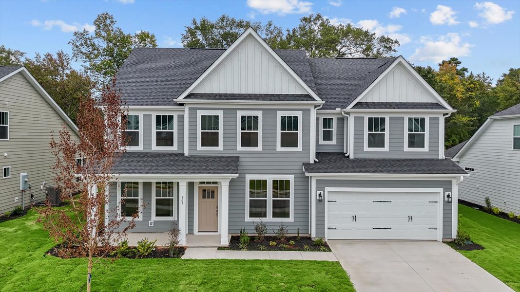 Representative exterior photo of a completed home built from the Stonefield by DRB Homes in Pinebrook, Woodruff, SC (Image 20). Representative exterior photo of a completed home built from the Stonefield by DRB Homes in Pinebrook, Woodruff, SC (Image 20).
