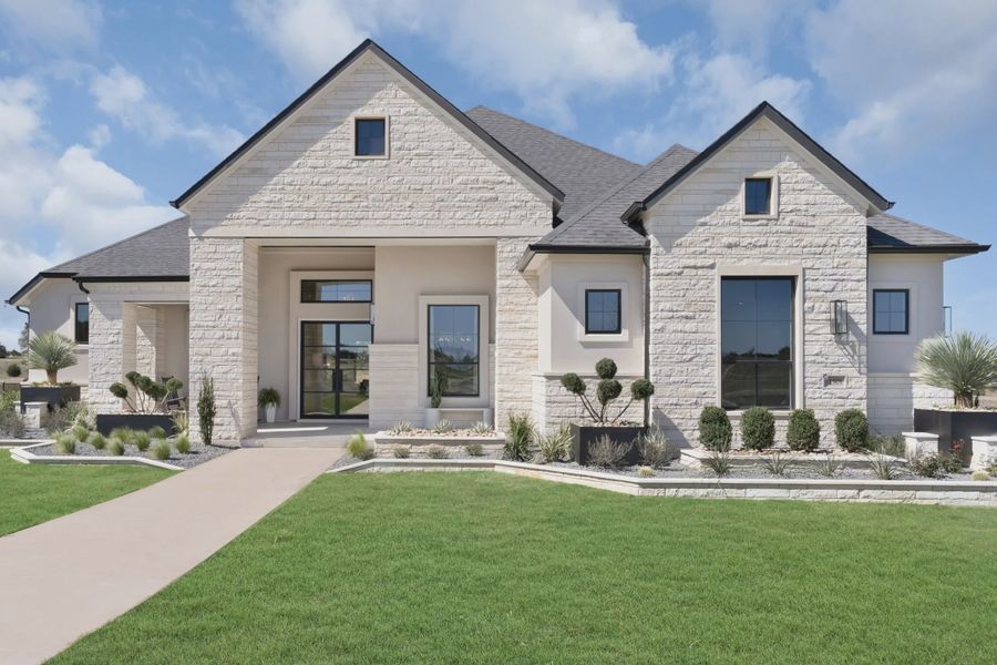 Representative exterior photo of a completed home built from the Reese by Chesmar Homes in Feathergrass, Fulshear, TX (Image 9).