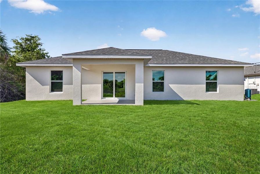 Exterior details and patio area of a home in , Port Charlotte (Image 17). Exterior details and patio area of a home in , Port Charlotte (Image 17).