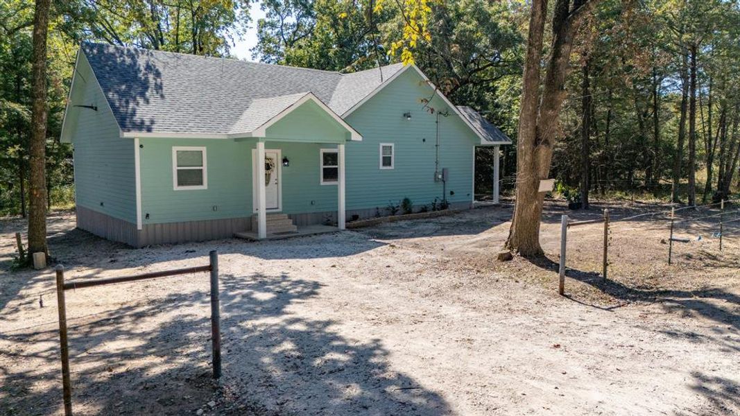 Exterior details and patio area of a home in , Quinlan (Image 3). Exterior details and patio area of a home in , Quinlan (Image 3).