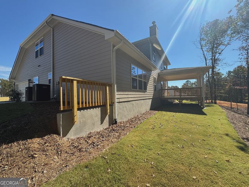 Exterior details and patio area of a home in Tuscany Hills, Douglasville (Image 4).