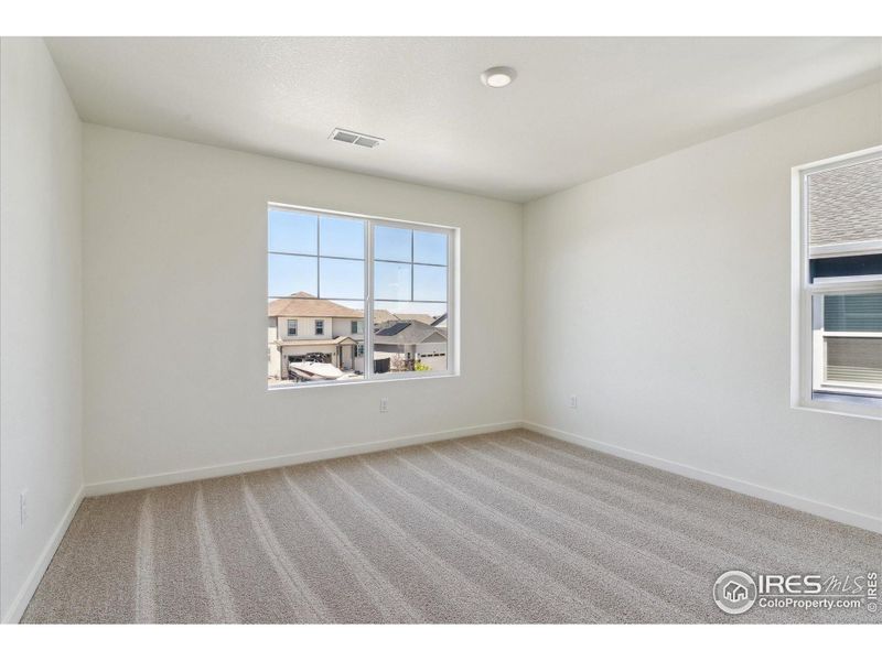 Spacious, unfurnished interior of a new home in Silver Peaks, Lochbuie (Image 20).