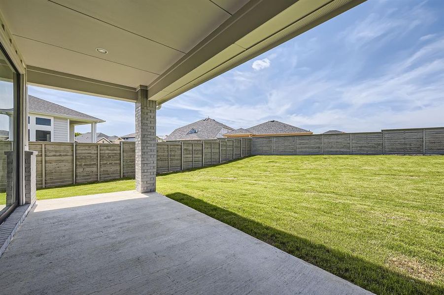 View of yard with a patio area View of yard with a patio area