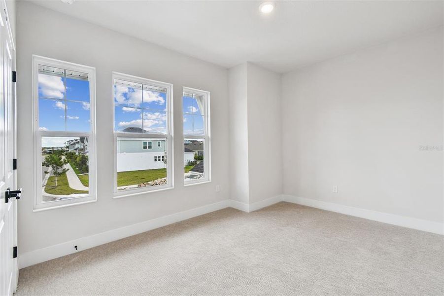 Spacious, unfurnished interior of a new home in Emerald Landing at Waterside at Lakewood Ranch – Lake Series, Sarasota (Image 16).