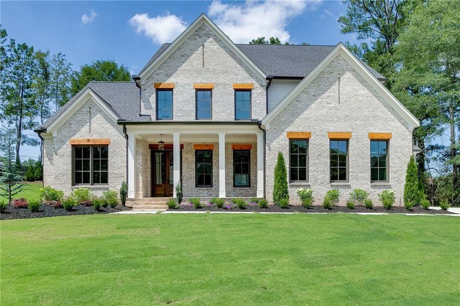 Front exterior of a new home in , Buford, GA, highlighting curb appeal (Image 36).
