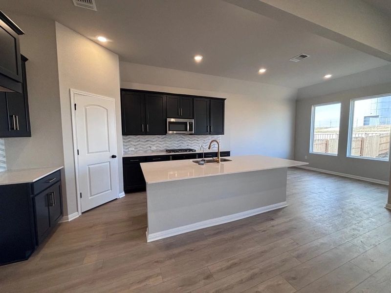 Furnished interior view inside a new home in The Colony, Bastrop (Image 6).