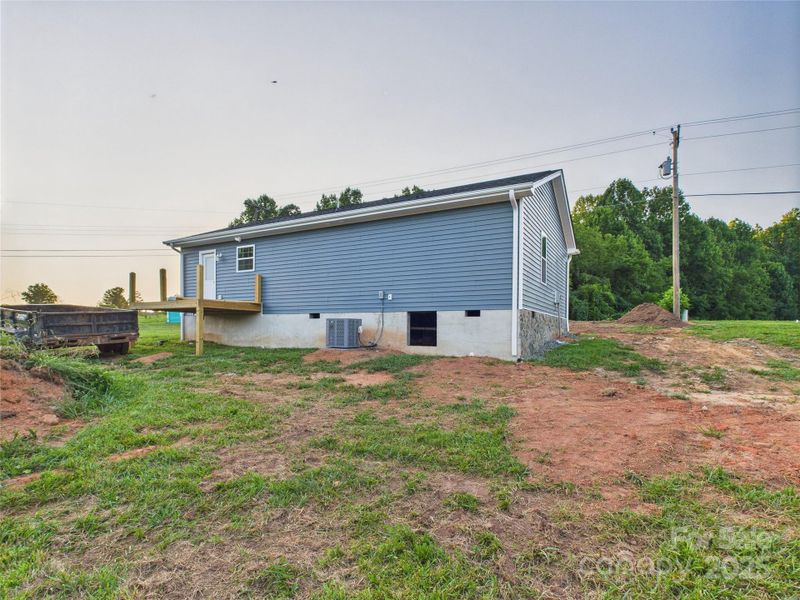 Exterior details and patio area of a home in , Hudson (Image 3). Exterior details and patio area of a home in , Hudson (Image 3).