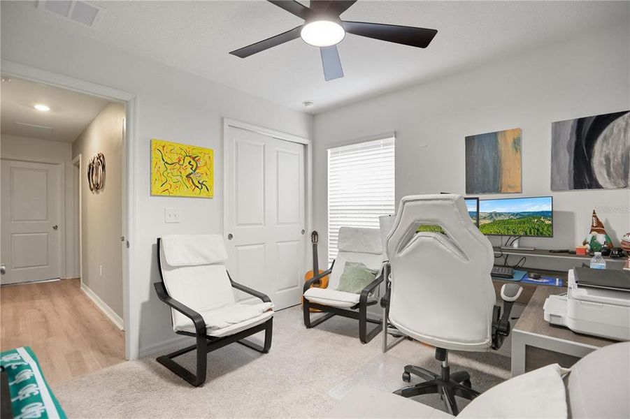 Furnished interior view inside a new home in Bellaviva I at Westside, Davenport (Image 31).