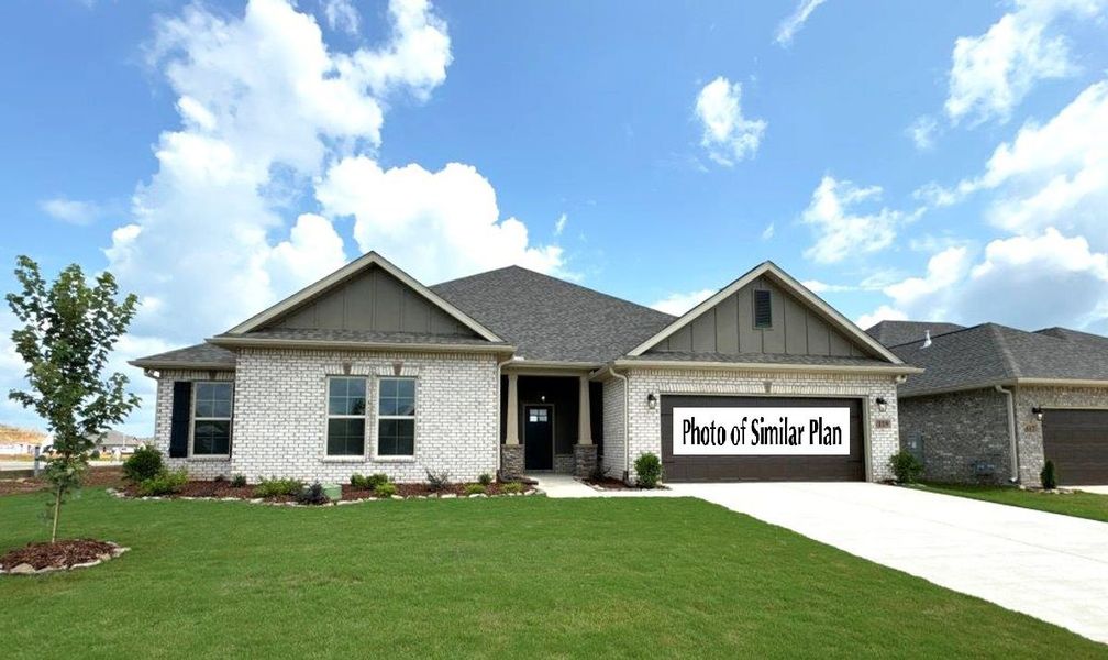 Front exterior of a new home in Iron Rock, Cantonment, FL, highlighting curb appeal (Image 2).