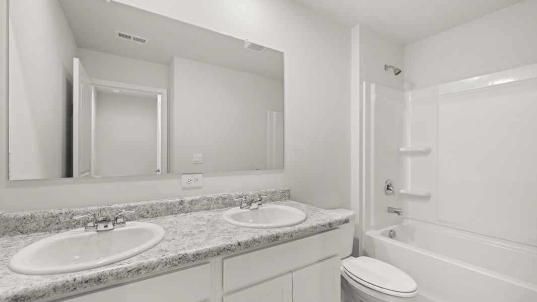 Representative furnished interior of a home built from the Belhaven by D.R. Horton in Creekview, Atlanta (Image 12).