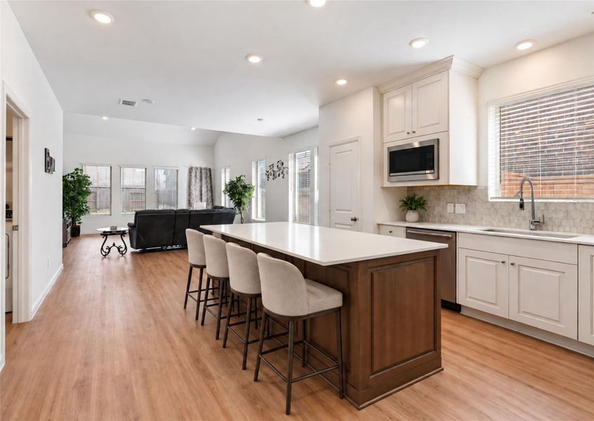 Large kitchen island is perfect for entertaining guests!
