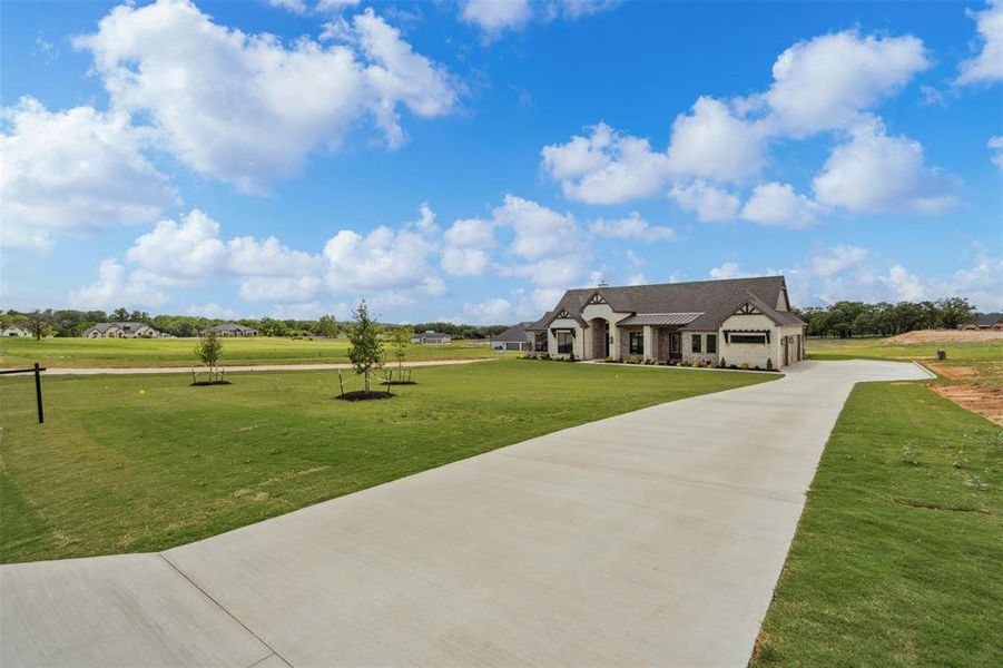 Front exterior of a new home in , Weatherford, TX, highlighting curb appeal (Image 1). Front exterior of a new home in , Weatherford, TX, highlighting curb appeal (Image 1).