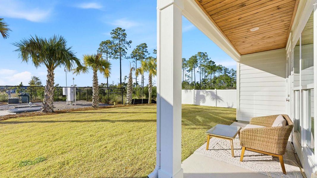 Exterior details and patio area of a home in Breakfast Point East Phase I, Panama City Beach (Image 26).