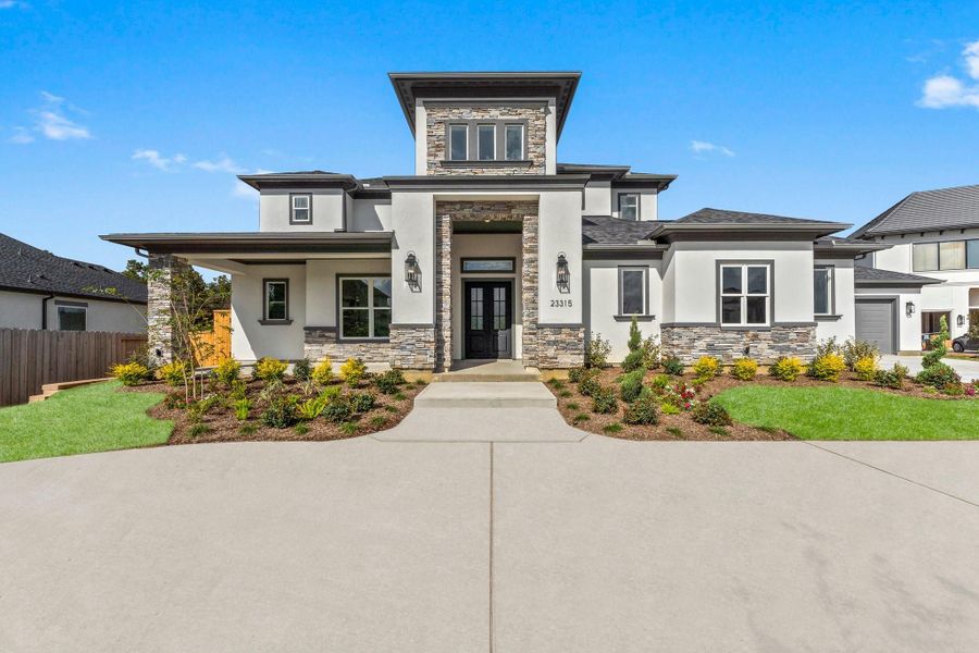 Front exterior of a new home in , Spring, TX, highlighting curb appeal (Image 1). Front exterior of a new home in , Spring, TX, highlighting curb appeal (Image 1).