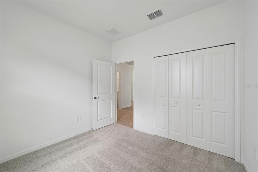 Spacious, unfurnished interior of a new home in Southpointe, Palmetto (Image 12). Spacious, unfurnished interior of a new home in Southpointe, Palmetto (Image 12).