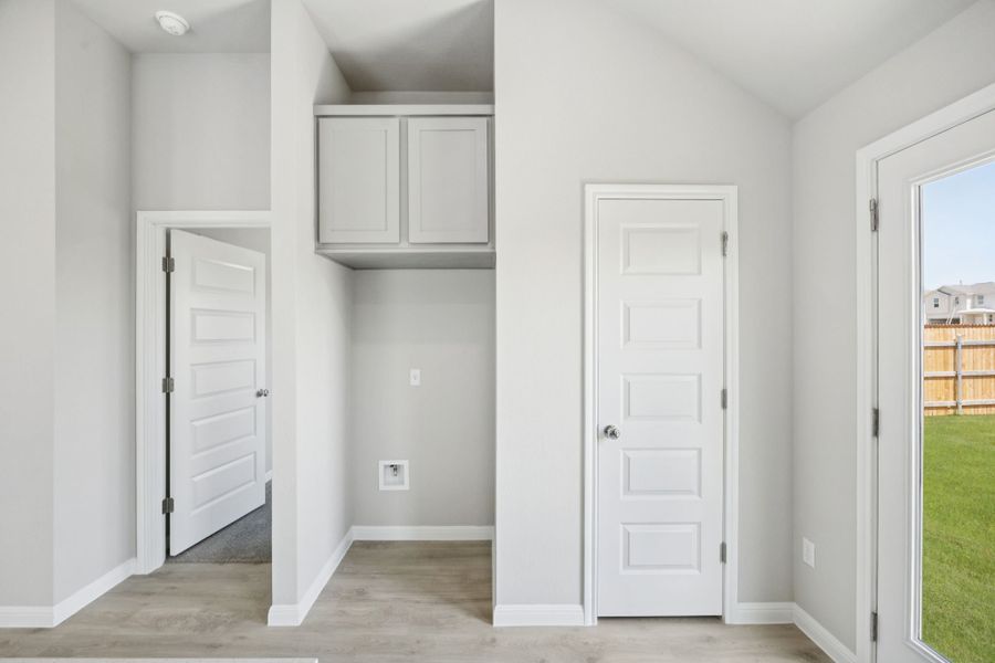 Kitchen in the Pine home plan by Trophy Signature Homes - REPRESENTATIVE PHOTO