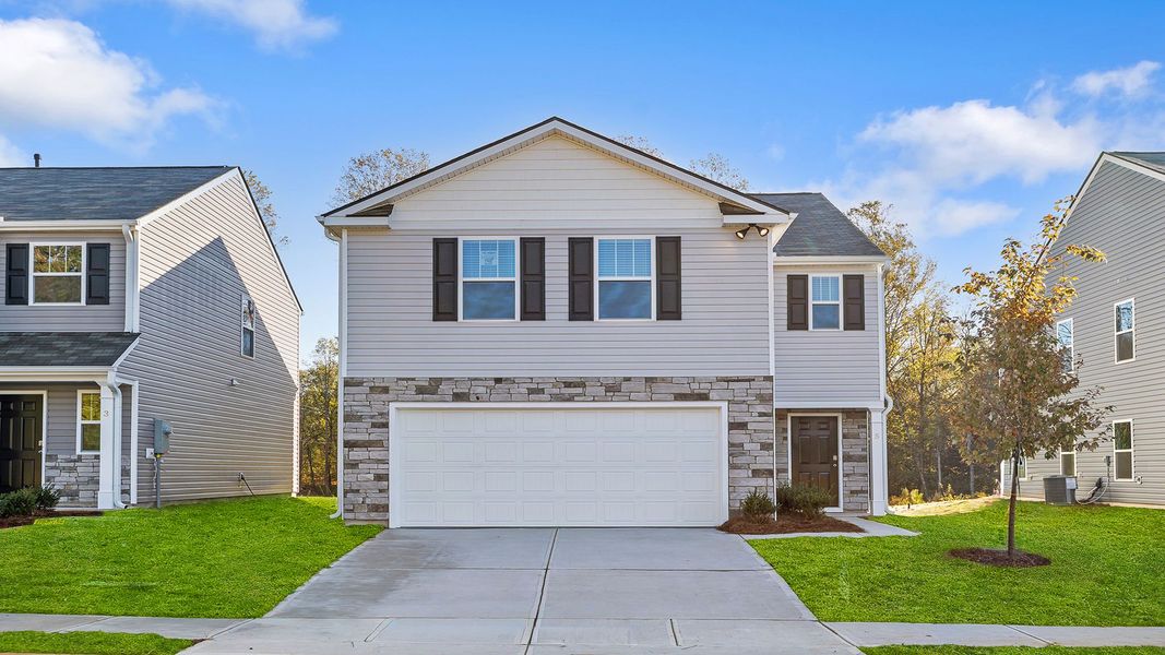 Front exterior of a new home in Cedar Gap, Fountain Inn, SC, highlighting curb appeal (Image 1).