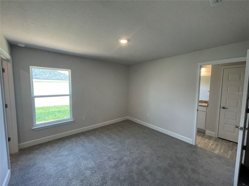 Spacious, unfurnished interior of a new home in Abbey Glen, Dade City (Image 19).