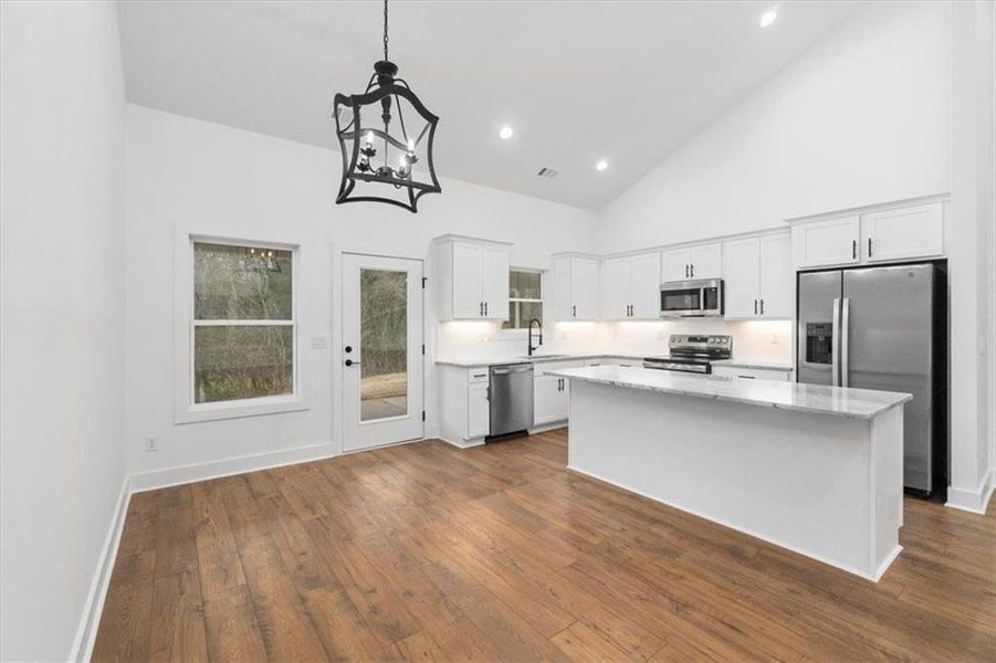 Furnished interior view inside a new home in , Monroe (Image 13).