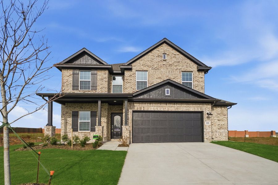 Front exterior of a new home in Saddlebrook Estates, Waxahachie, TX, highlighting curb appeal (Image 1). Front exterior of a new home in Saddlebrook Estates, Waxahachie, TX, highlighting curb appeal (Image 1).