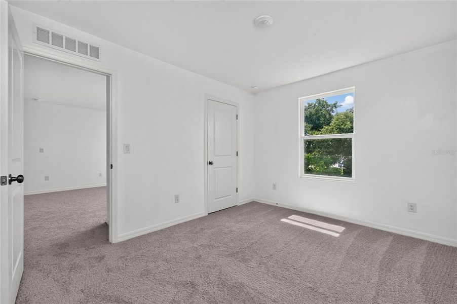 Spacious, unfurnished interior of a new home in , Port Charlotte (Image 52).