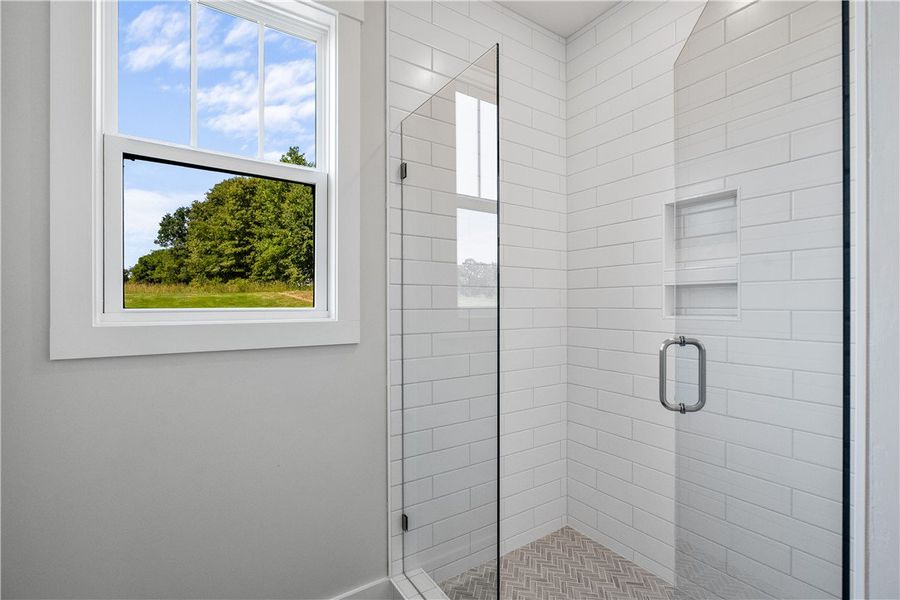 A window in the bathroom allows natural light and