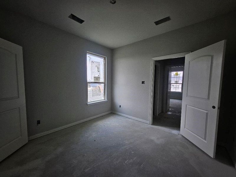 In-progress construction of a new home in The Hollow, Ennis, TX (Image 13).