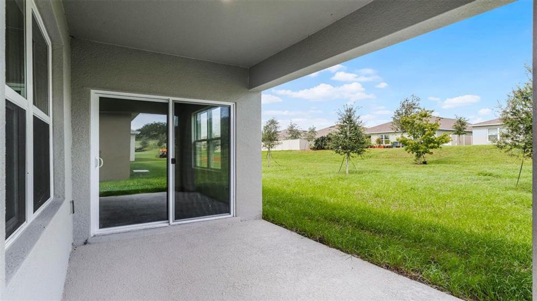 Exterior details and patio area of a home in Fountain View, Ormond Beach (Image 2).