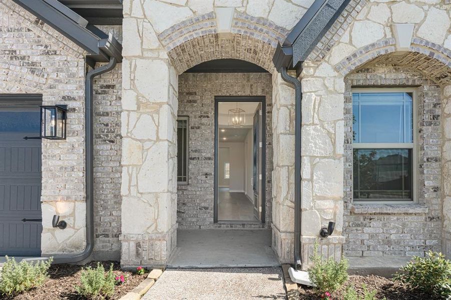 Front exterior of a new home in Legacy Ranch Classic 60, Melissa, TX, highlighting curb appeal (Image 24).
