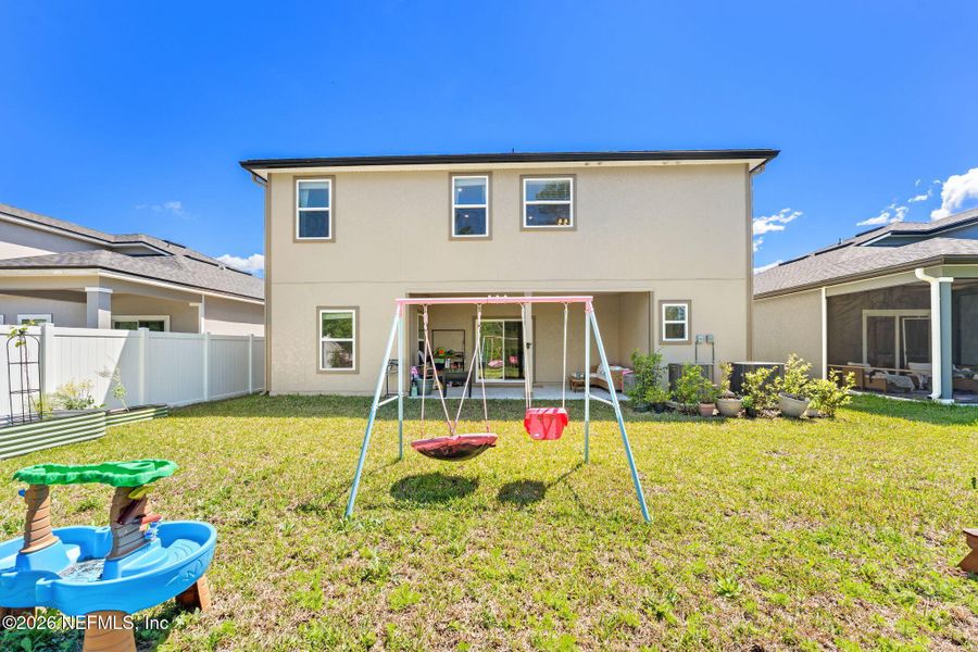 Exterior details and patio area of a home in Wilford Oaks, Orange Park (Image 27).