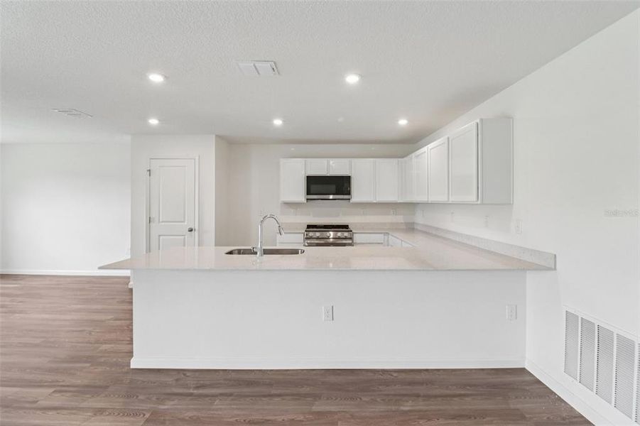 Furnished interior view inside a new home in Sumter Villas, Sumterville (Image 14).